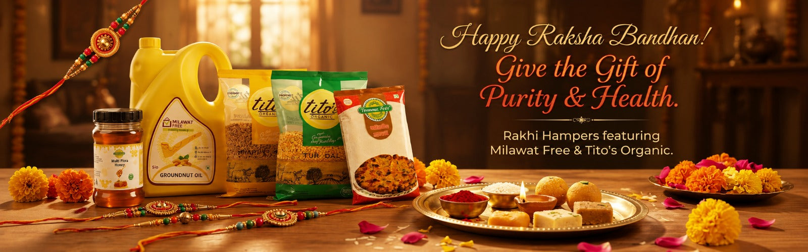Happy Raksha Bandhan Rakhi hamper featuring Milawat Free and Tito’s Organic products, with traditional sweets, flowers, diyas, and rakhis